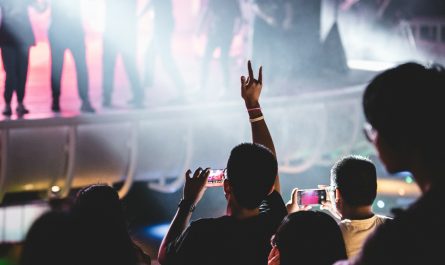 man in black crew neck t-shirt wearing black sunglasses
