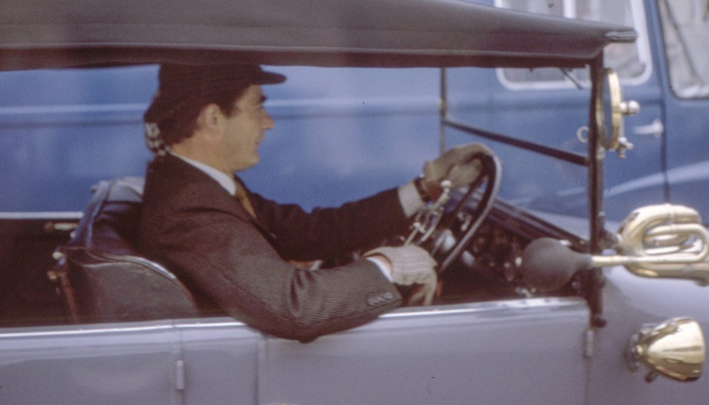 men ridding a car during daytime