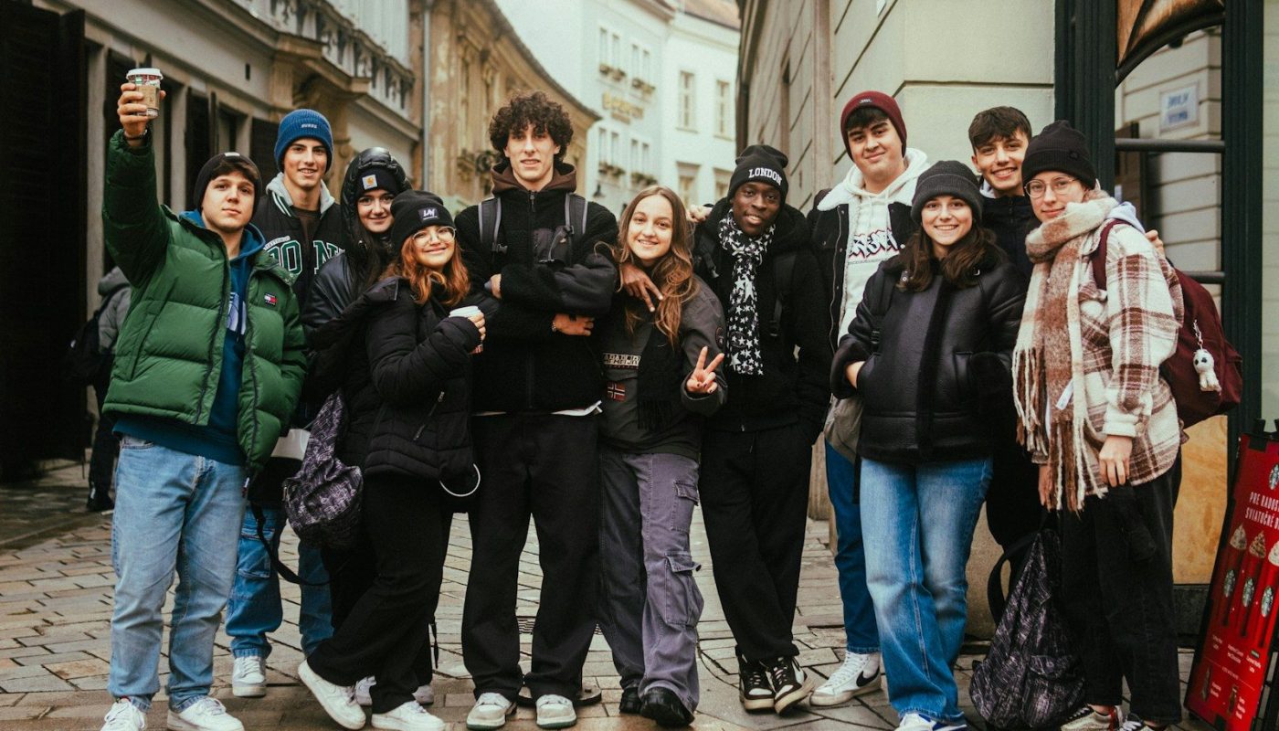 a group of young people standing next to each other