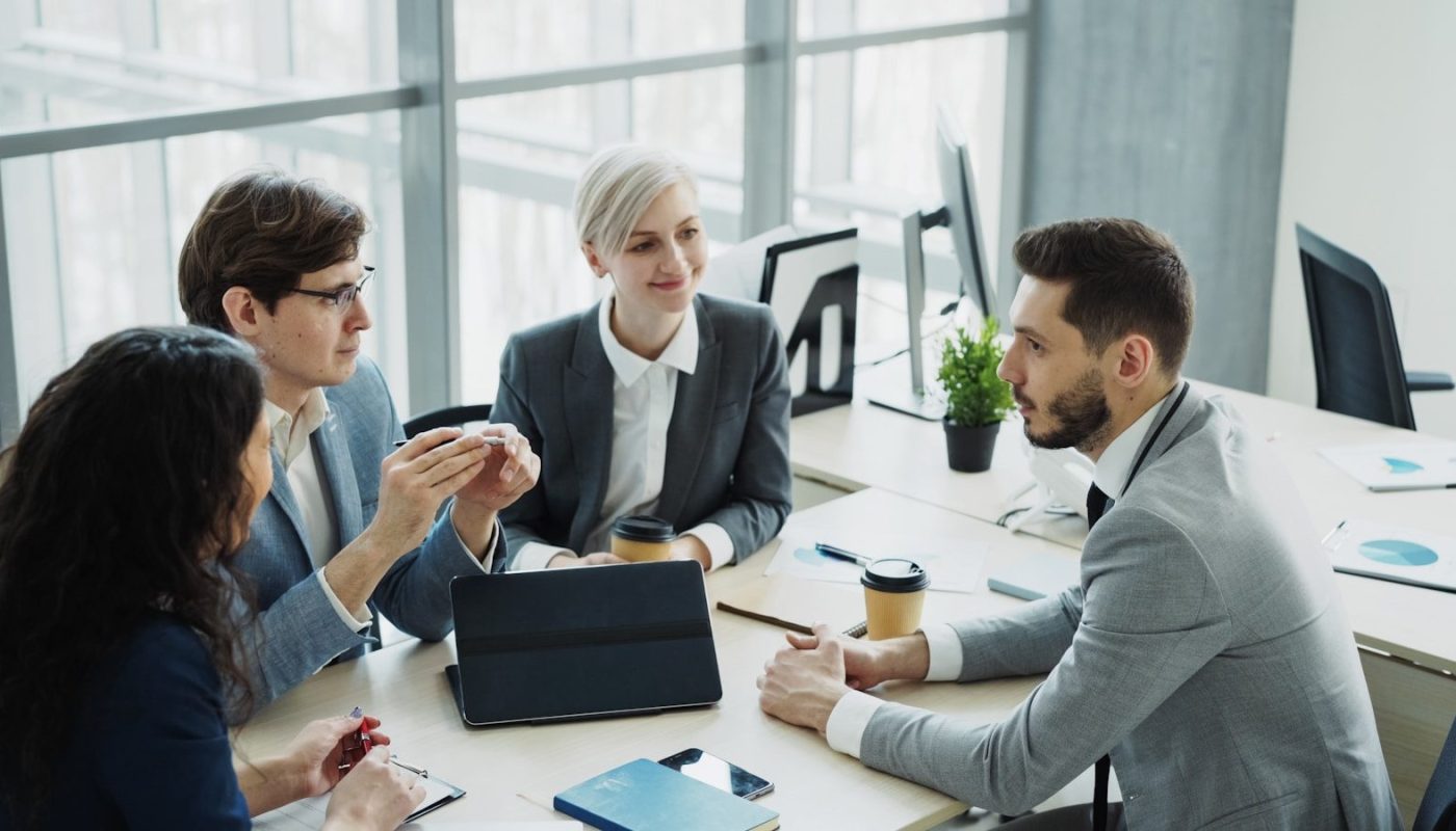 Diverse business team collaborating in a modern office.
