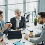 Diverse business team collaborating in a modern office.