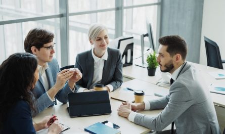 Diverse business team collaborating in a modern office.